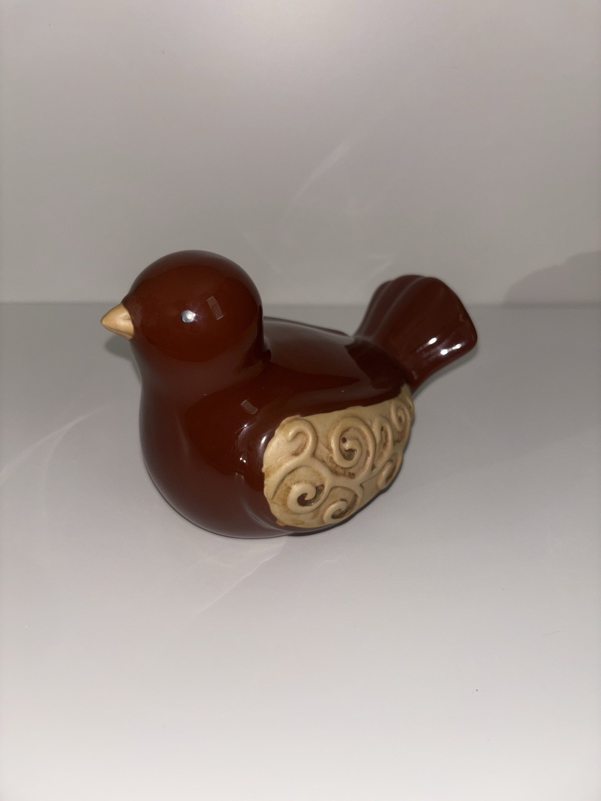 Charming Brown Ceramic Bird Figurine Glazed Body Detailed Wing Design