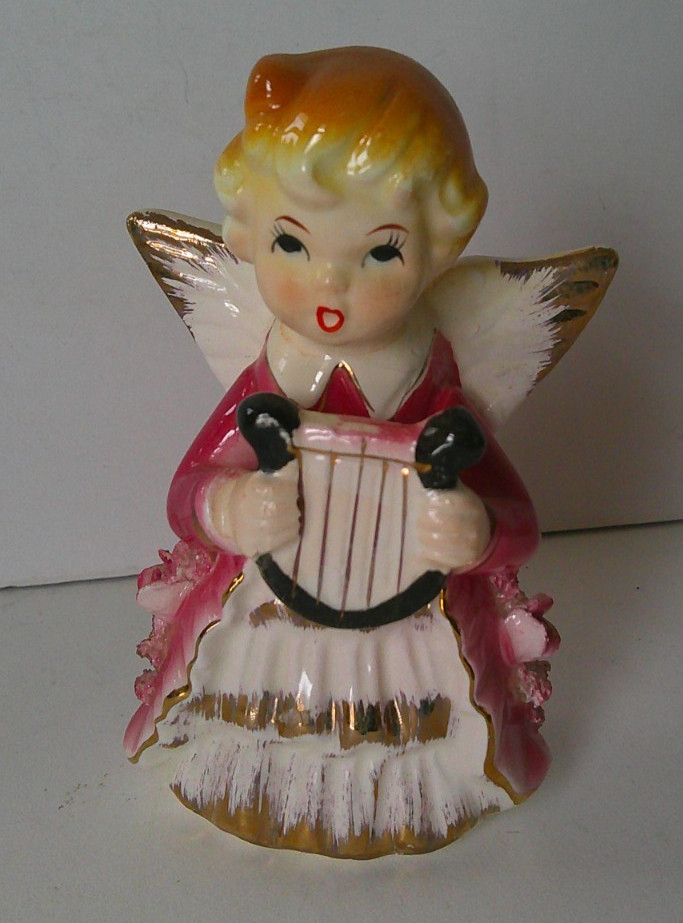 Angel in maroon with harp porcelain figurine