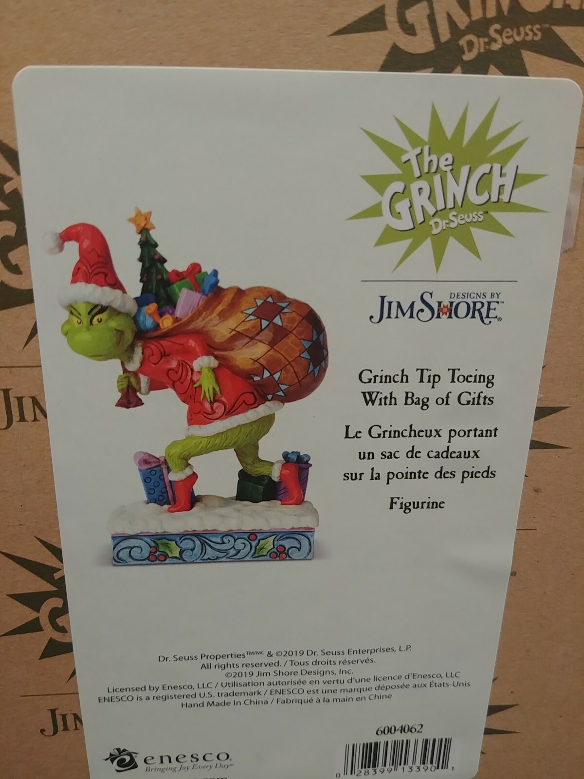 Dr. Seuss Grinch by Jim Shore Grinch Tip Toeing with Bag of Gifts 7.7″ Figurine