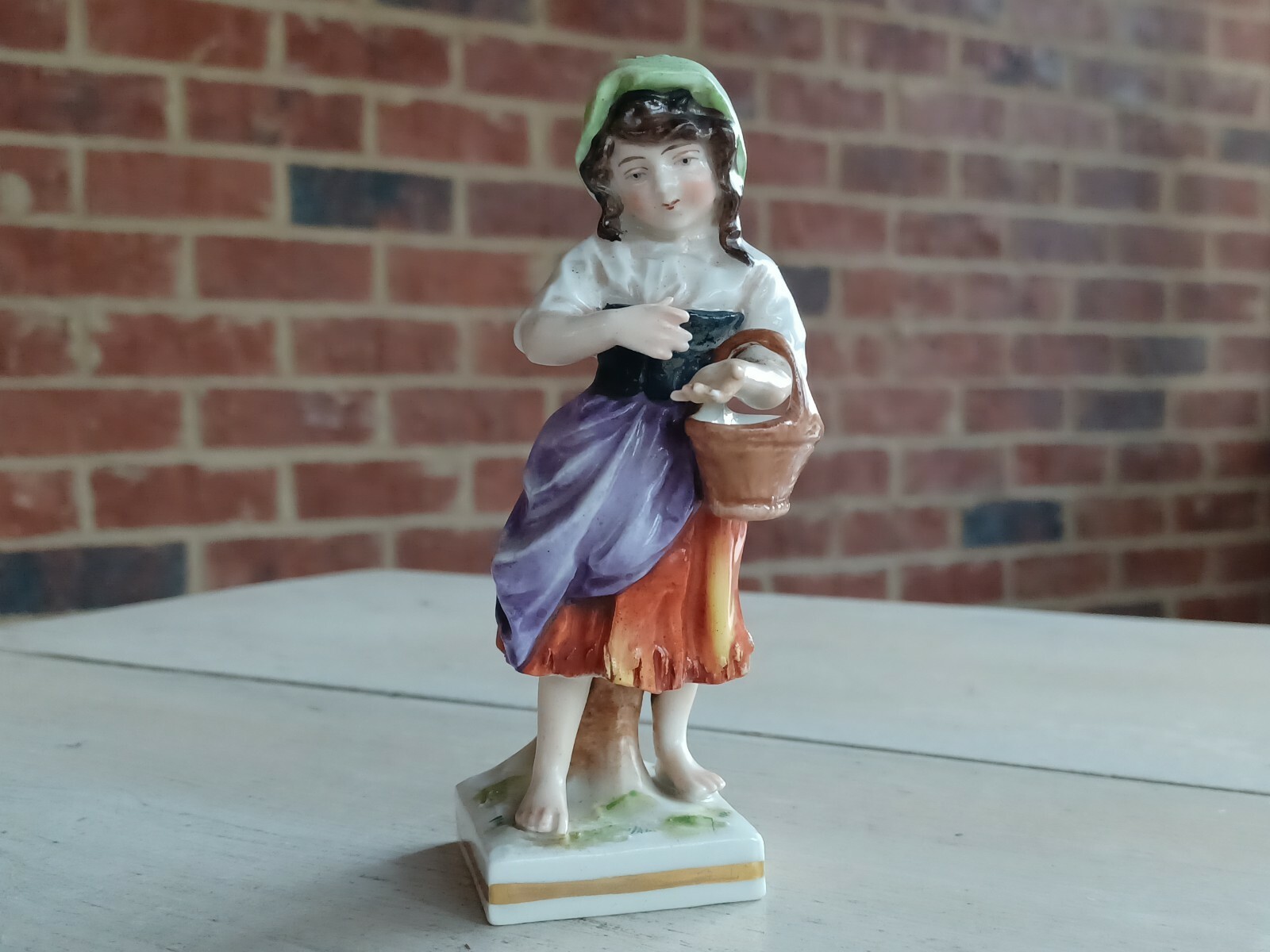 Antique PORCELAIN Girl FIGURINE w/ GOLD ANCHOR Mark on Back MAKER ??