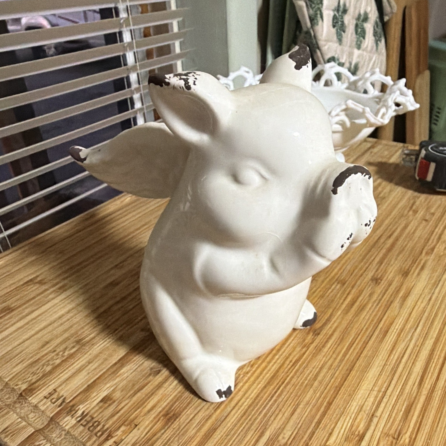 White Ceramic Winged Pig Figurine, Distressed Brown Accents, Glossy Finish