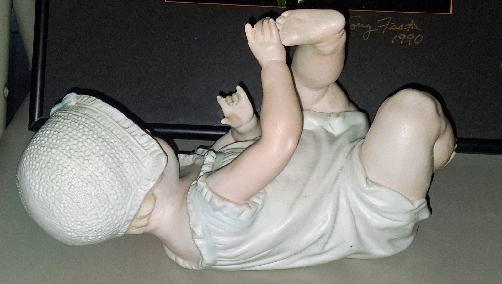 Gebruder Heubach-German Porcelain Bisque-Lying On Back Piano Baby–11″ Length