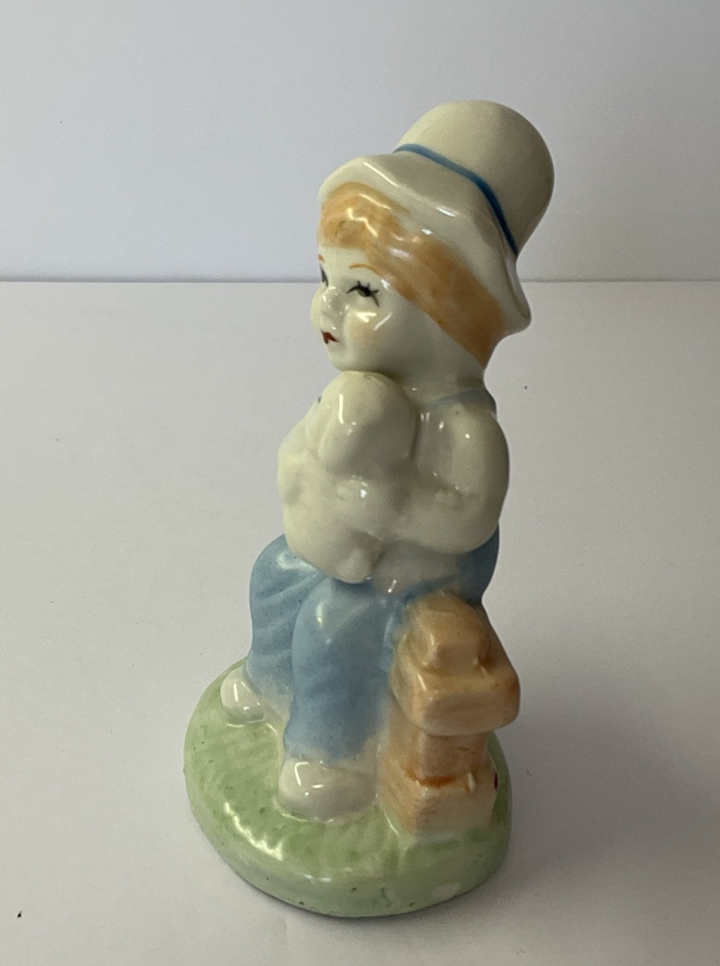 Vintage Boy Figurine in Overalls Holding Lamb Sitting on Fence 4.50” Tall