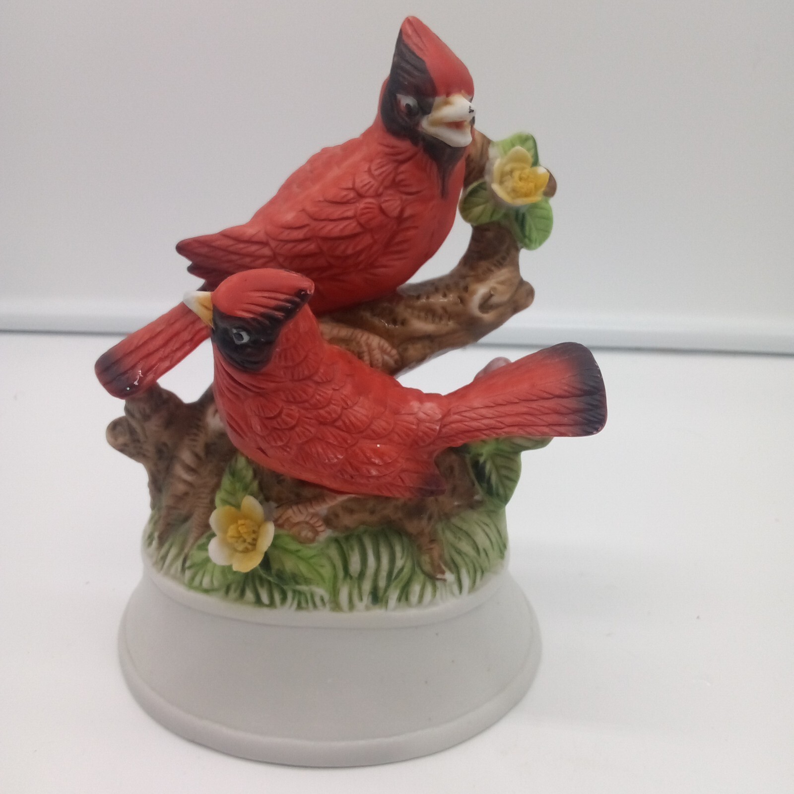 VINTAGE PAIR OF CARDINALS ON TREE BRANCH CERAMIC FIGURINE6.50”T.X4.75W