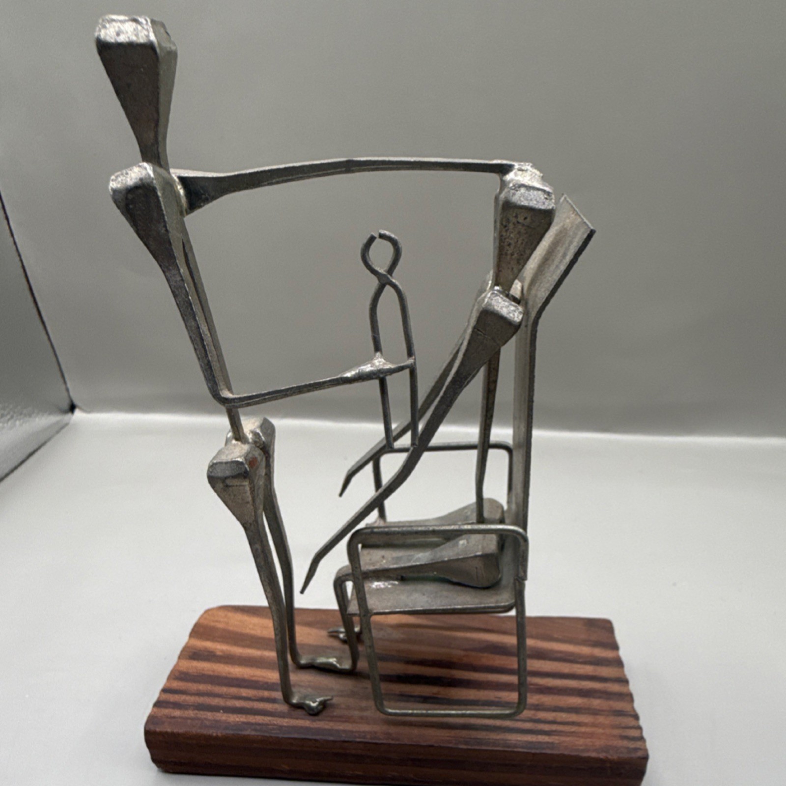 The Woodshed Abstract People Figure Sculpture Metal/Wood Base Silver Brown 7in