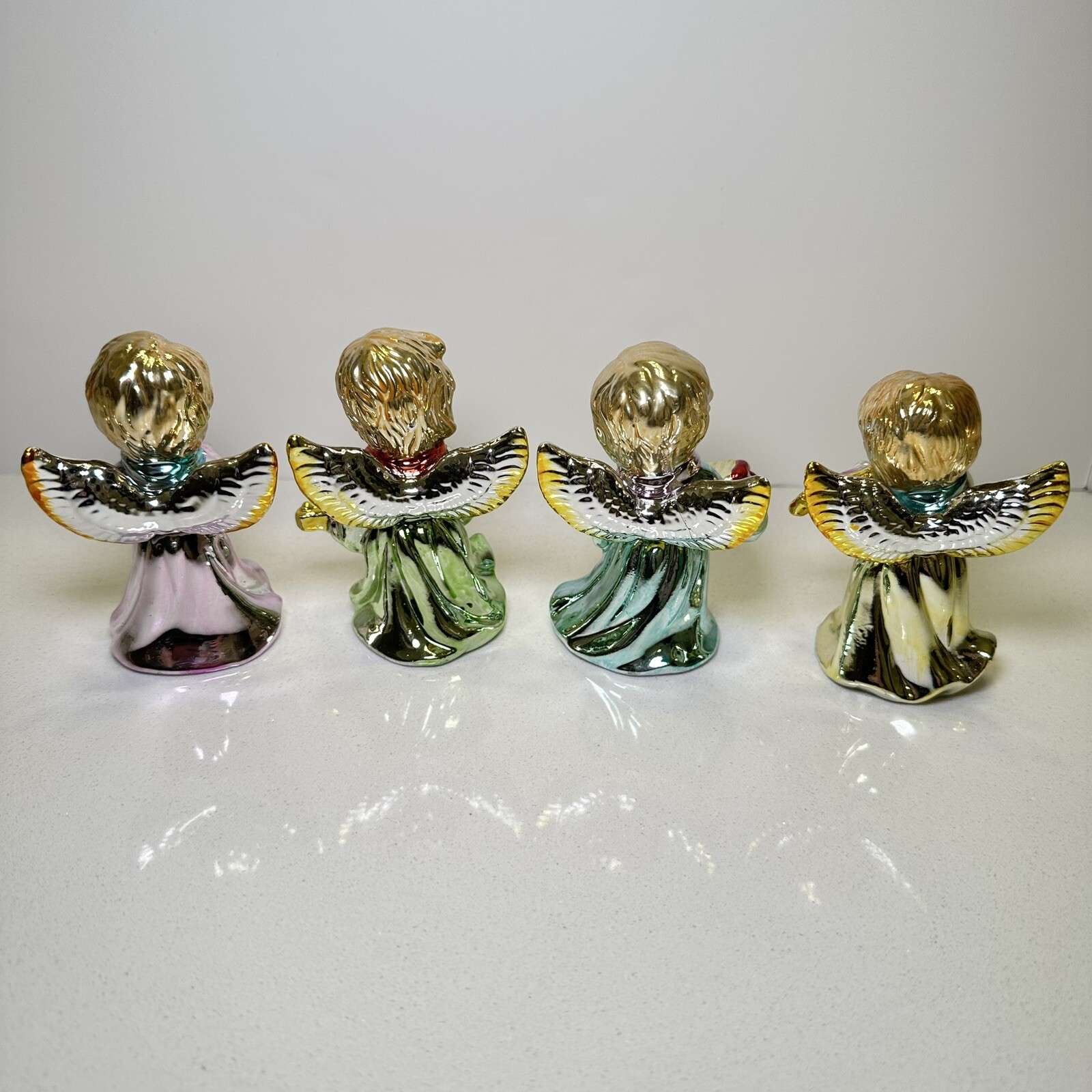 Vintage set of 4 Ceramic Musician Angels w/Gold And Multi Colored Metallic