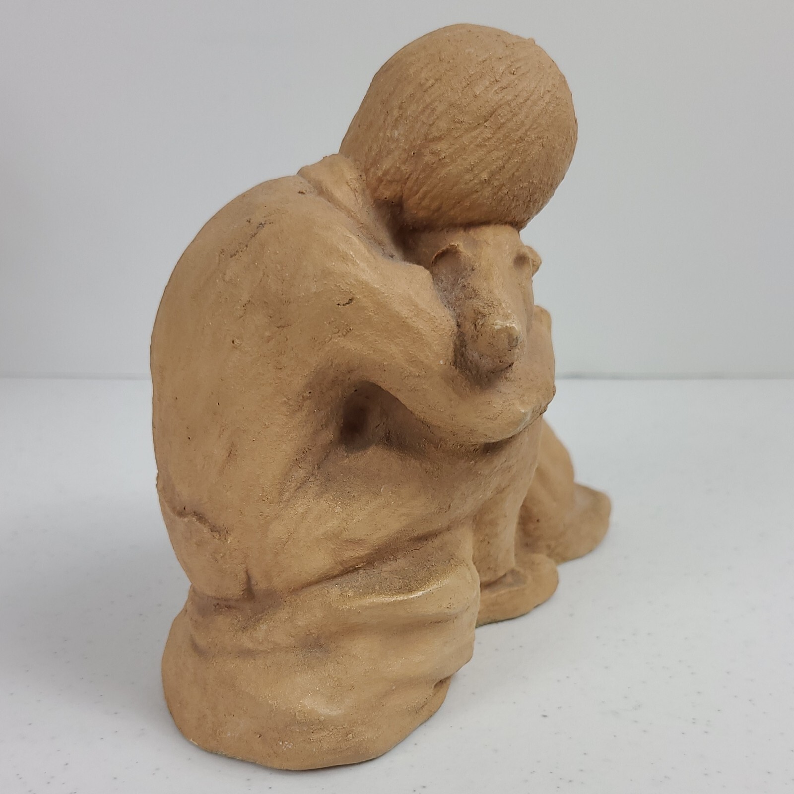Boy and His Dog Figurine Approx. 5 3/4”H x 7″L Resin ? Painted Matte Sand Finish