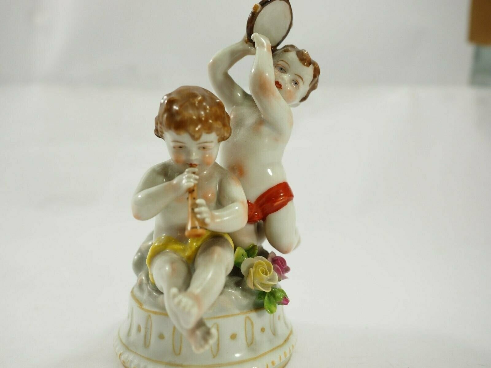 Adorable A.J.Uffrecht Porcelain figurine of two children playing Instruments