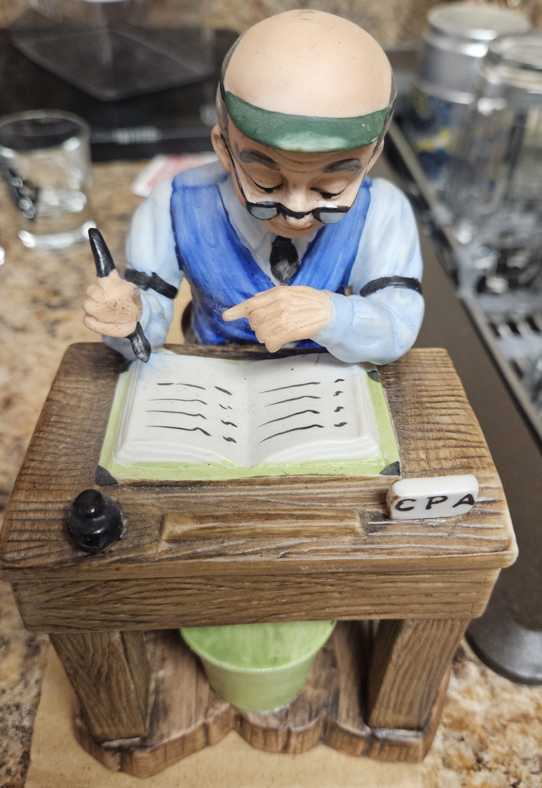 CPA figurine depicts a man working at a desk, Lefton