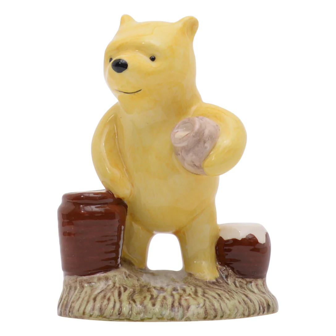 Pooh Counting The Honey Pots bear sculpture