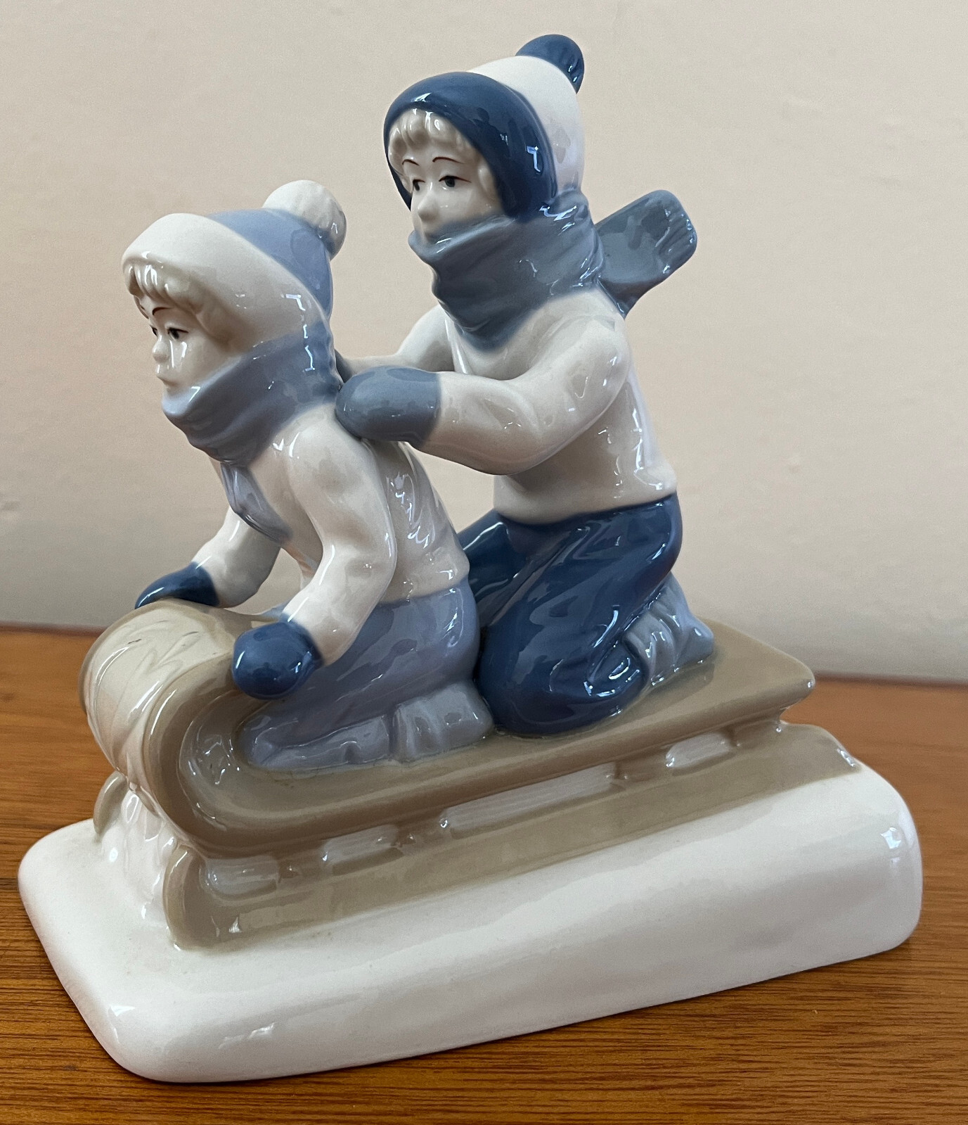 PAUL SEBASTIAN CUERNAVACA 2 KIDS SLEDDING FINE PORCELAIN FIGURINE