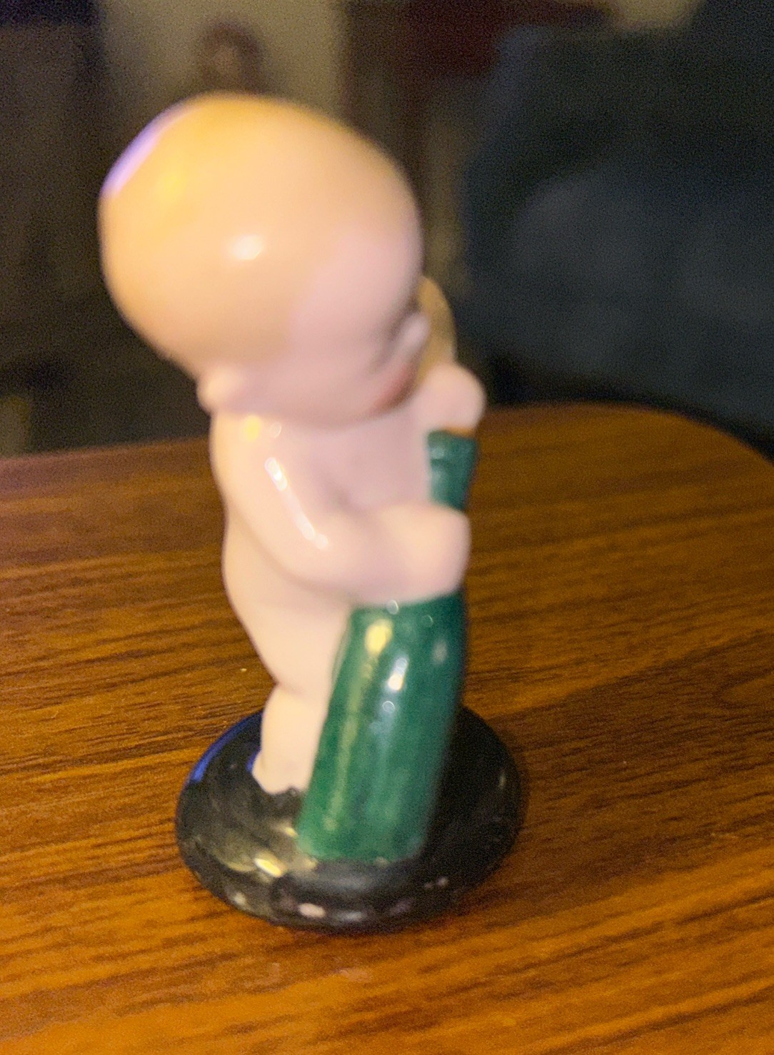 Vintage Porcelain Baby Pulling Cork From Bottle Figure