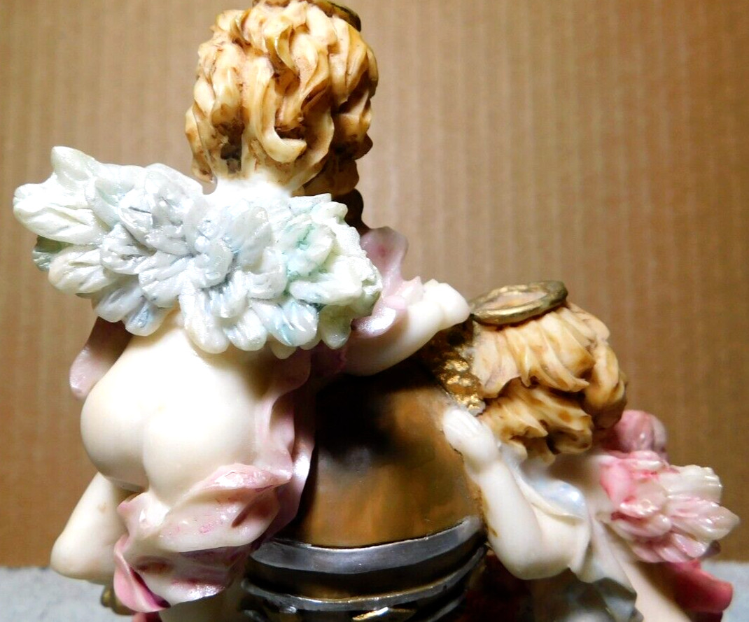 Star Collection~Two Cherubs Statues On A “RTB” Globe Ball Vintage