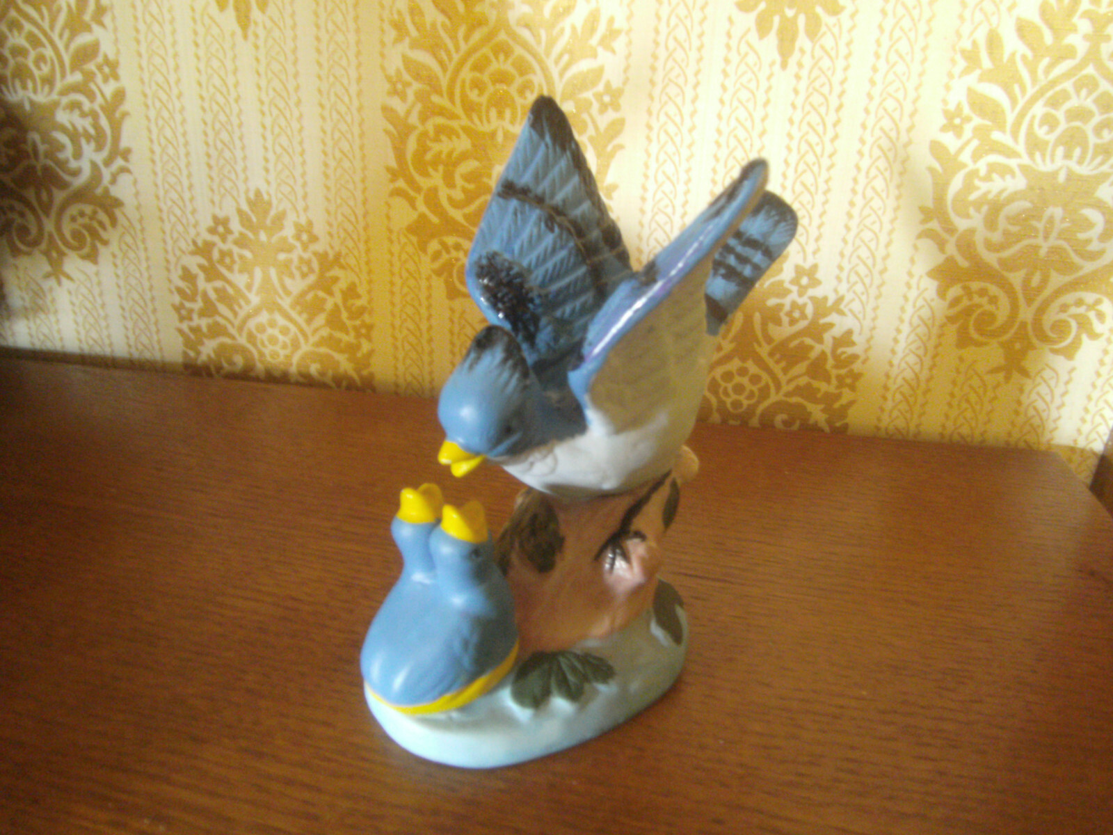 Blue Jay Mamma feeds young chicks hand painted figurine 5 1/2 inches tall Birds