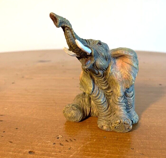 Tuskers Small Sitting Elephant Resin Figurine Used VG Condition Free Shipping