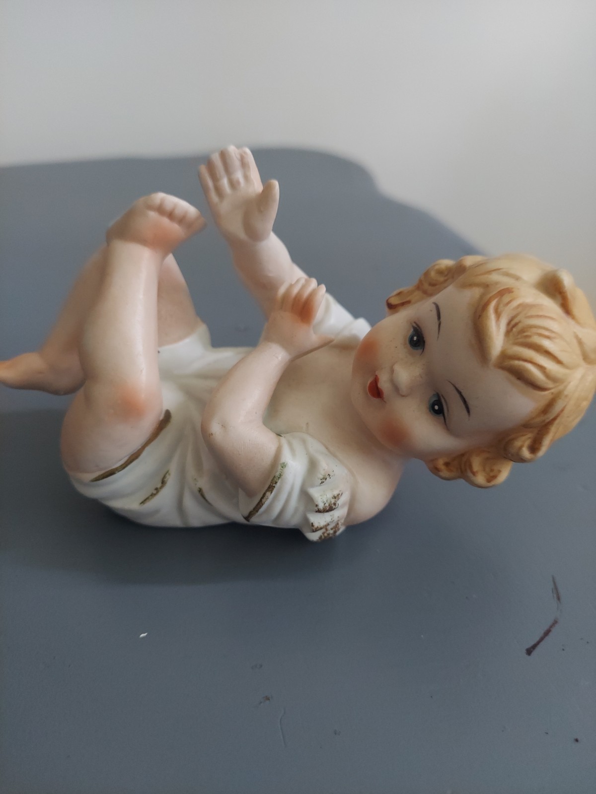 Vintage Porcelain Piano Baby Figurine