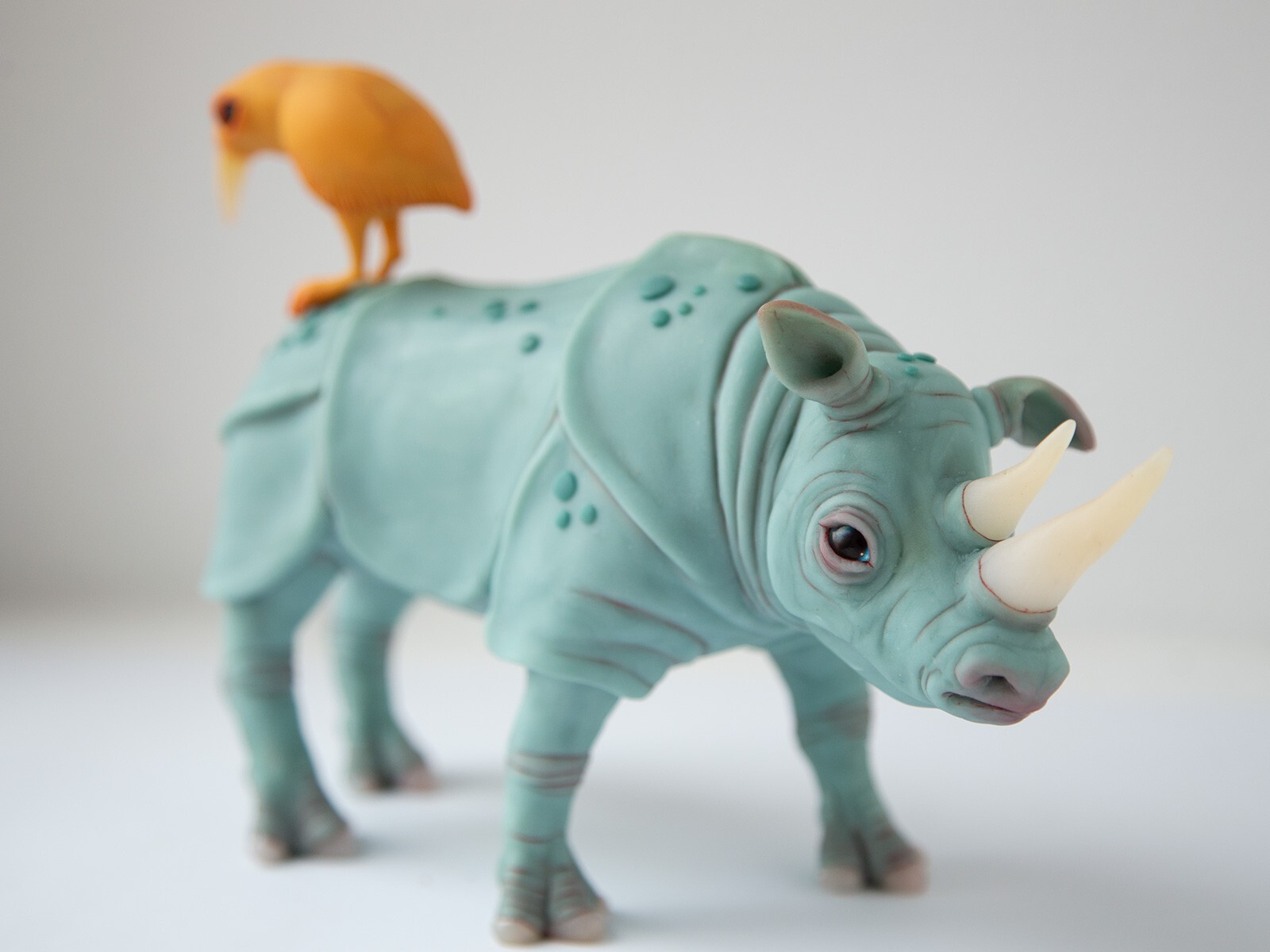 Perfect marriage – weird sculpture gift for couple, rhino and bird family statue