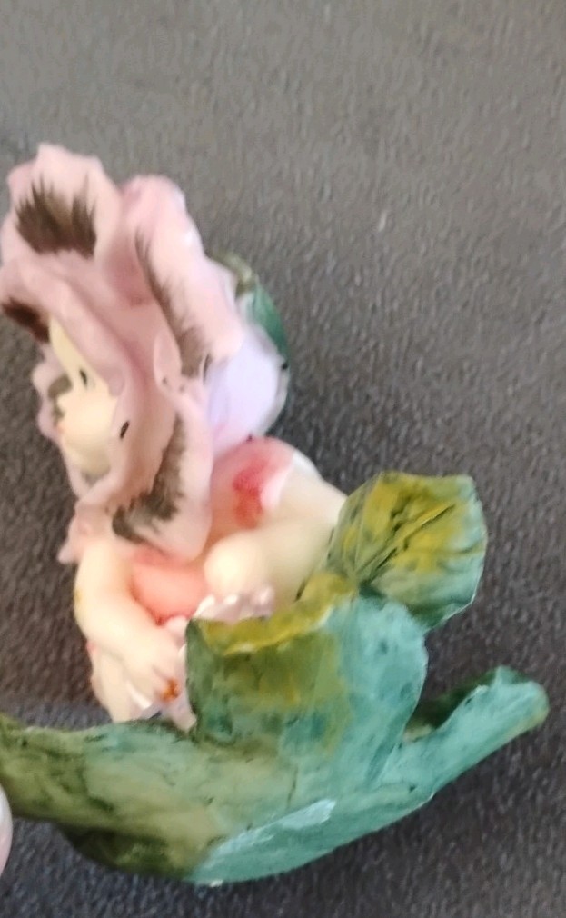 Vintage ceramic collectable flower baby figurines