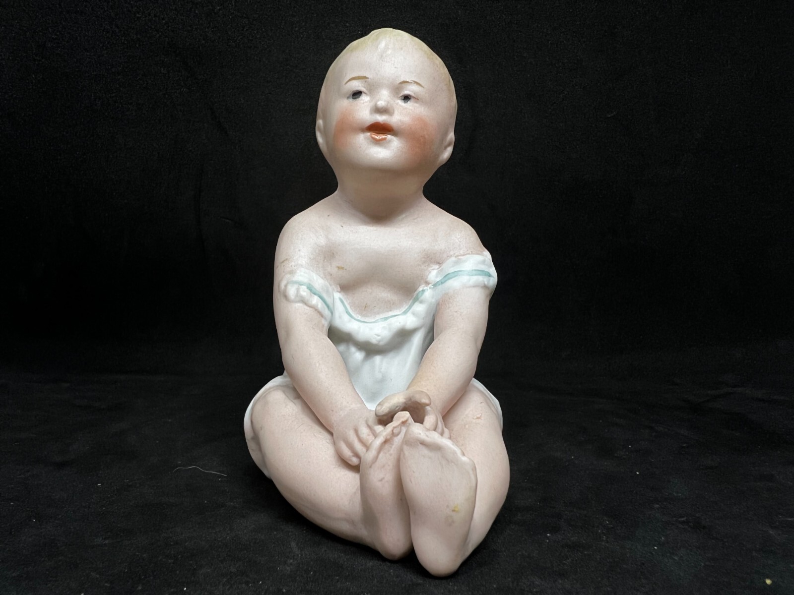 Gebruder Heubach-German Porcelain Bisque-Sitting Piano Baby 4 1/2″ #1