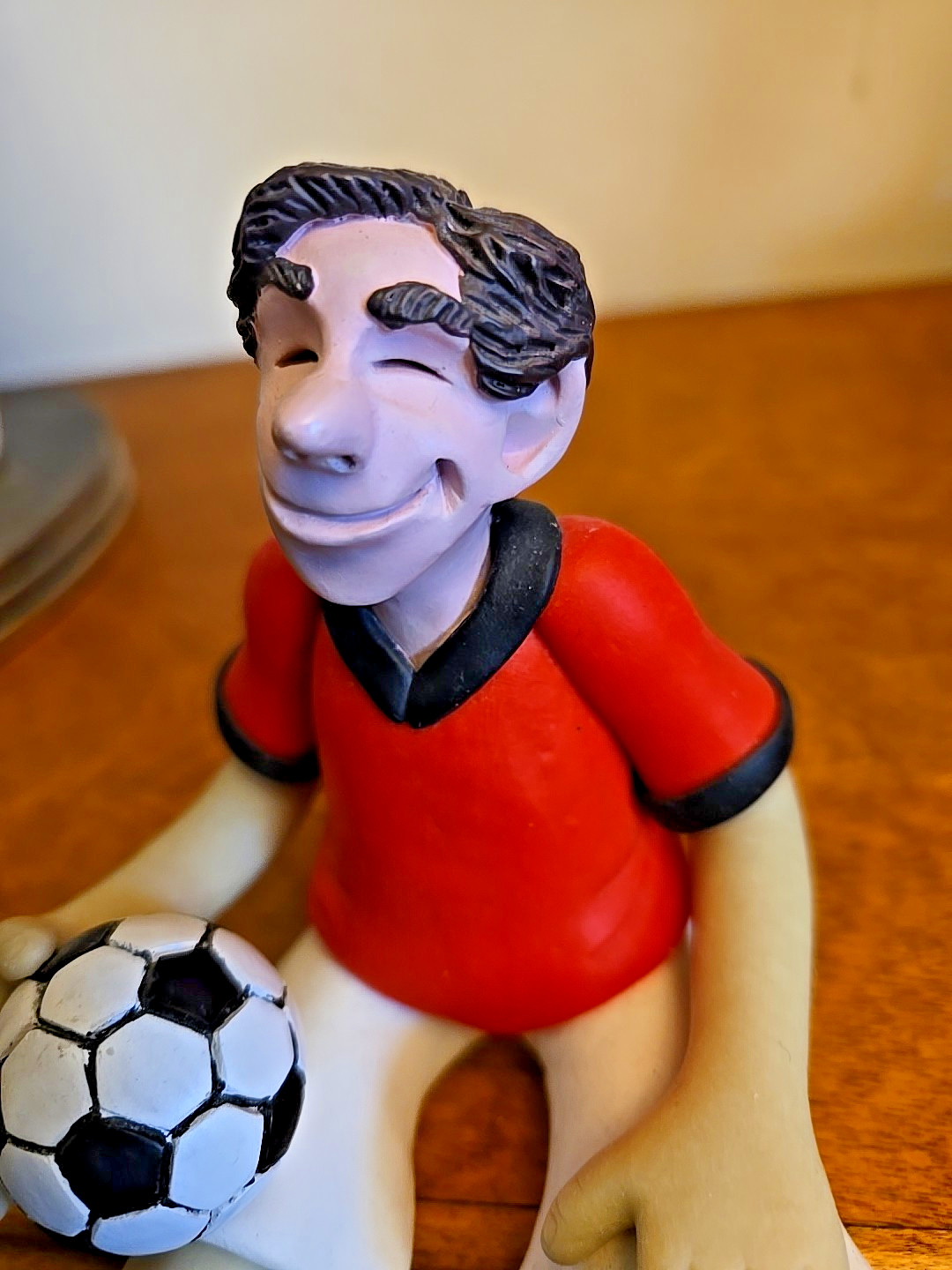 Edge Sitter Figurine • Soccer Player • Handmade Clay Composite – D. Manning