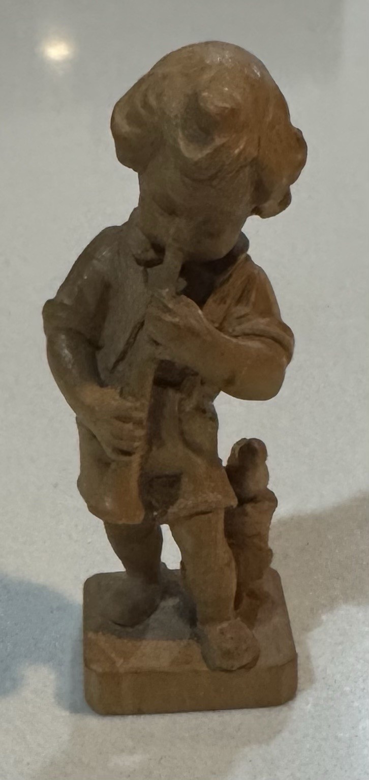 Switzerland Wooden Carved Boy Playing Clarinet