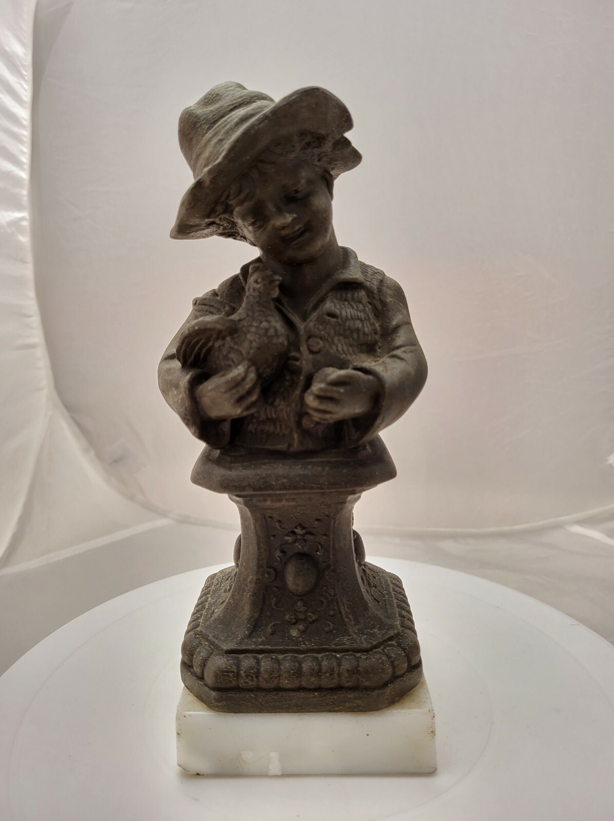 Cast Iron / Metal Figurine statue Boy Holding A Bird / Chicken 9”