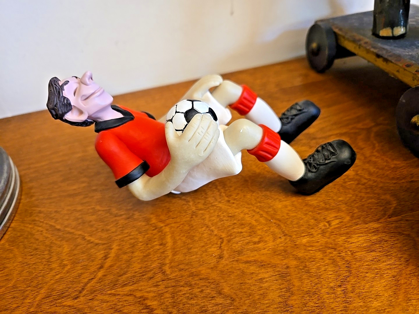 Edge Sitter Figurine • Soccer Player • Handmade Clay Composite – D. Manning