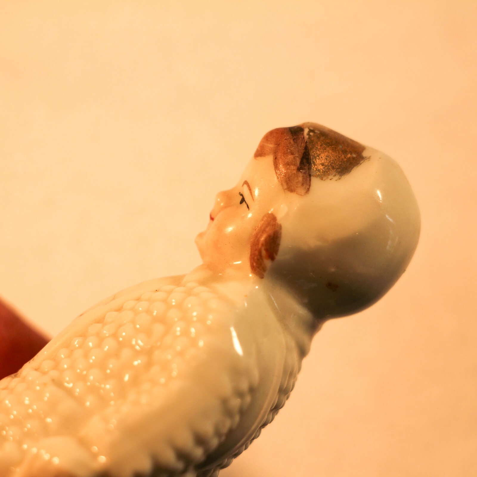 vintage Girl in knit coat porcelain figurine 3.75″ Germany