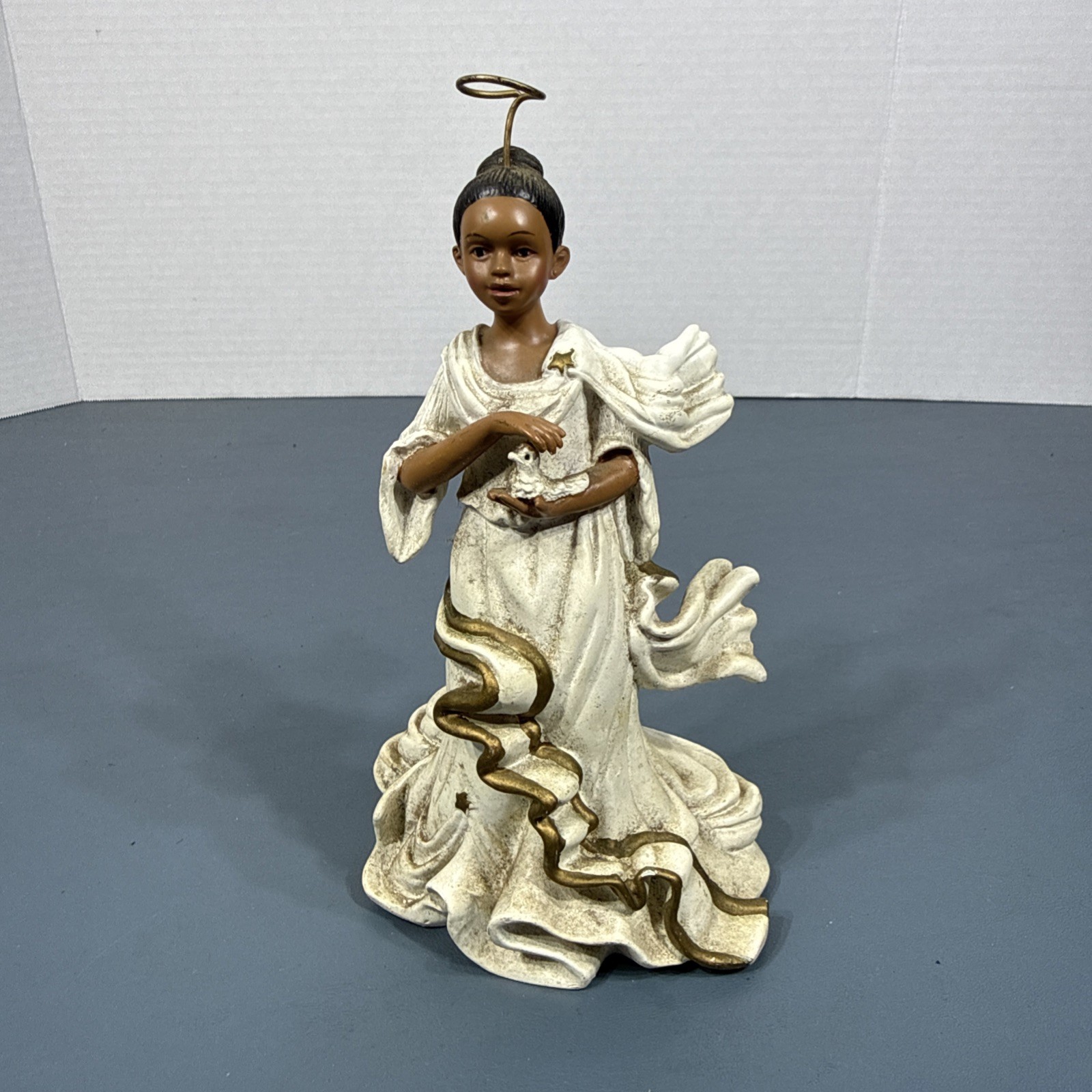 African American Female Angel Figurine Wearing White Robe holding a Dove