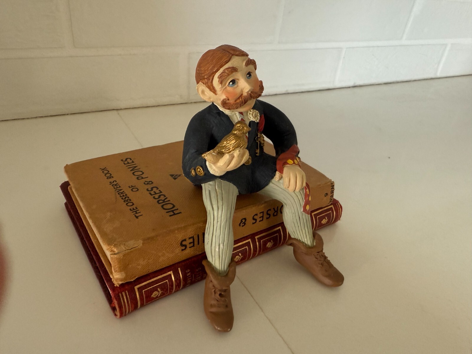 Shenandoah Designs Internatiional A Keeper Figurine Sitting Man w Bird in Hand