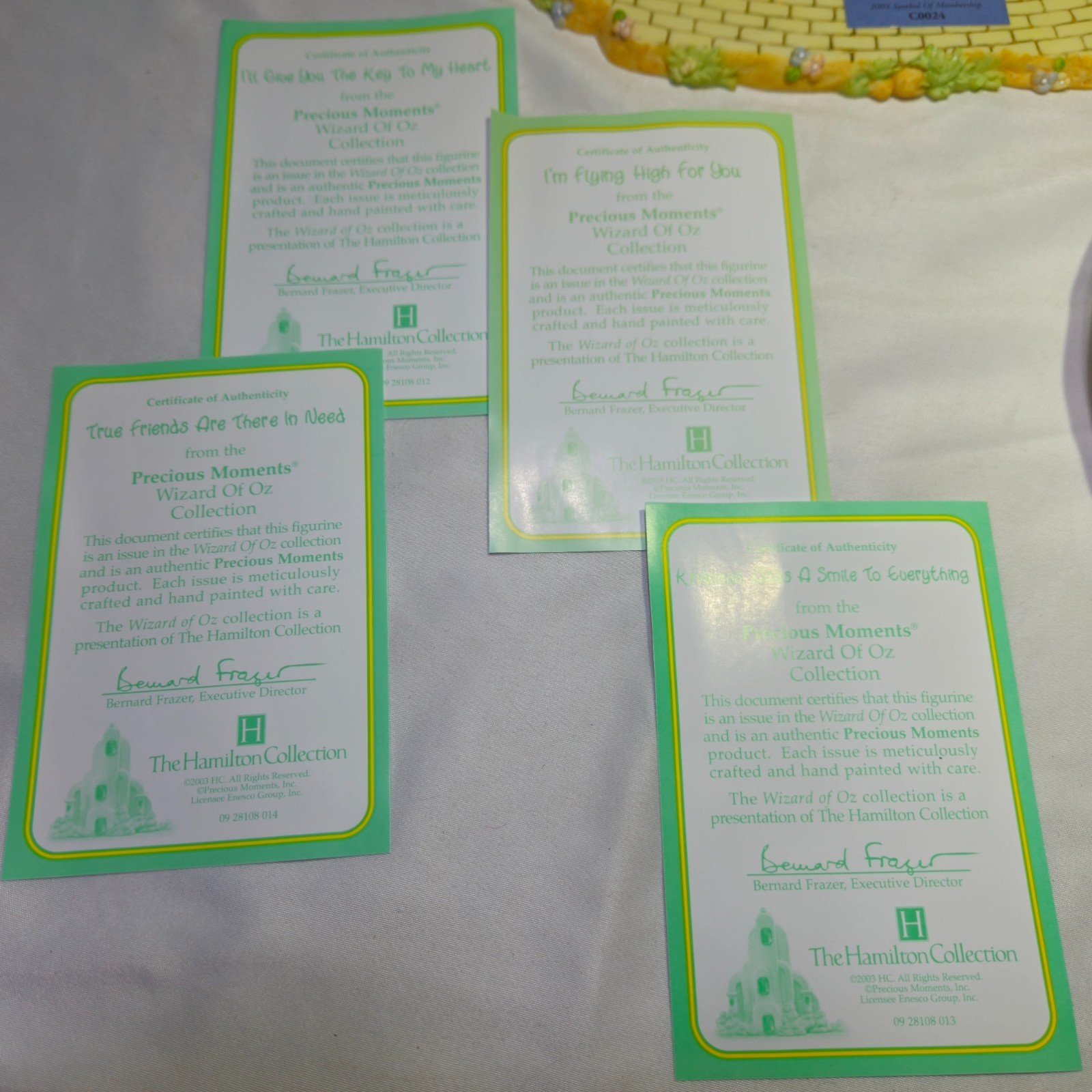 Precious Moments Wizard Of Oz 4pc Set 2004 ENESCO GROUP INC. 4 Certs & 3 Plates