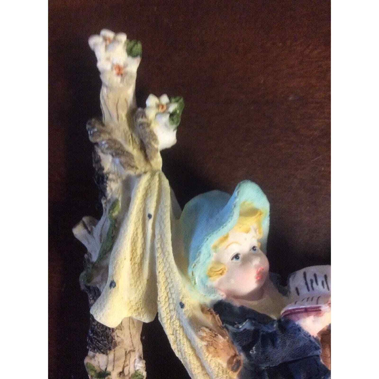 Boy Reading Book In Hammock Surrounded By Nature 6″ Tall Resin Figurine