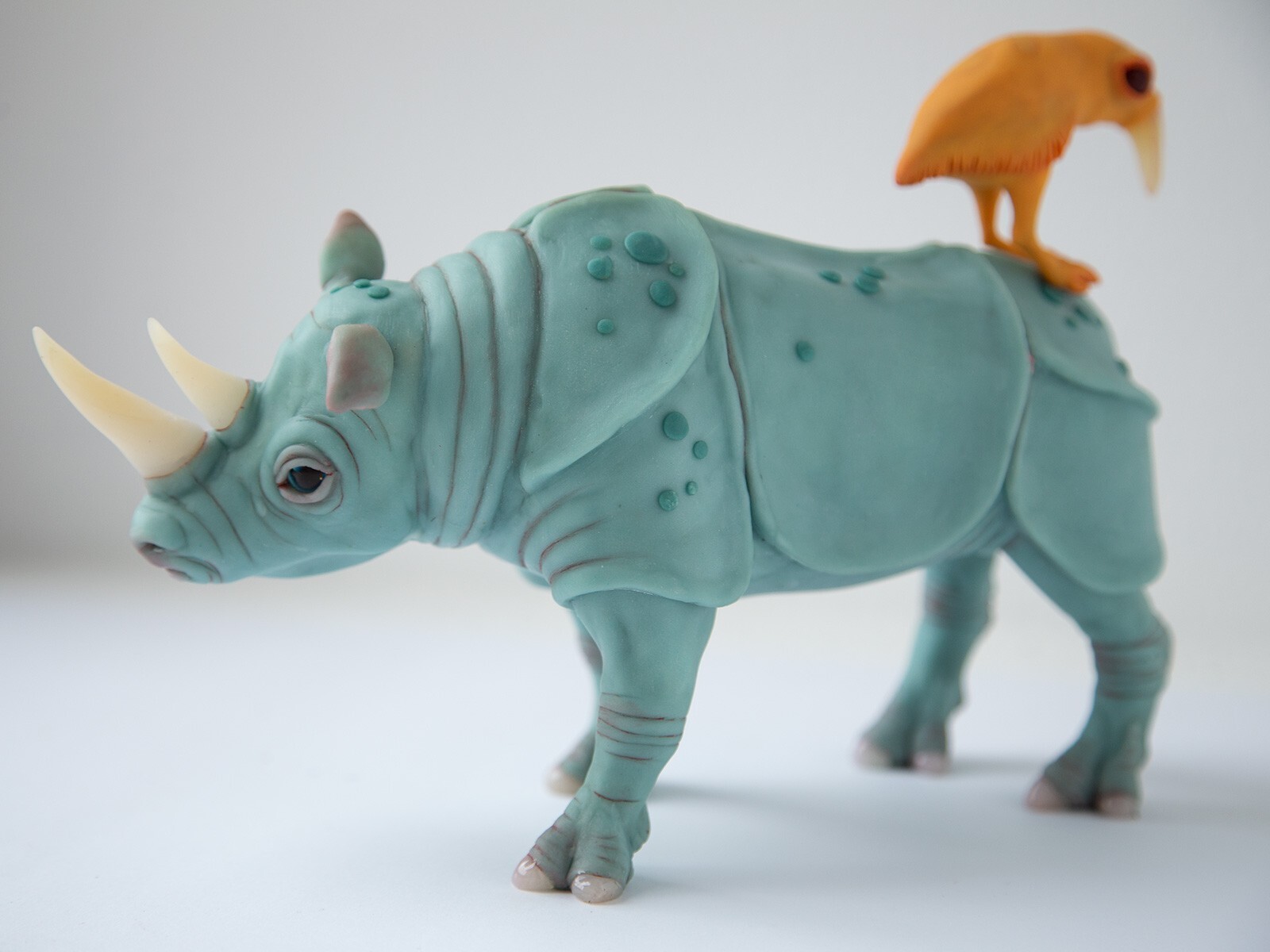 Perfect marriage – weird sculpture gift for couple, rhino and bird family statue