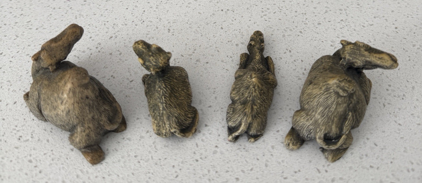 Vintage Taiwan R.O.C. Stone Camel Figurines in traditional sitting pose Set of 4
