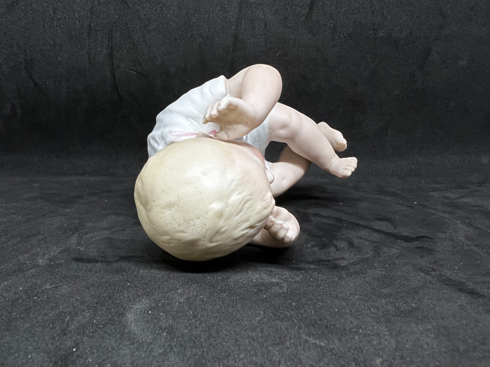 Gebruder Heubach-German Porcelain Bisque-Sitting-Hands Up Piano Baby 4 1/2″