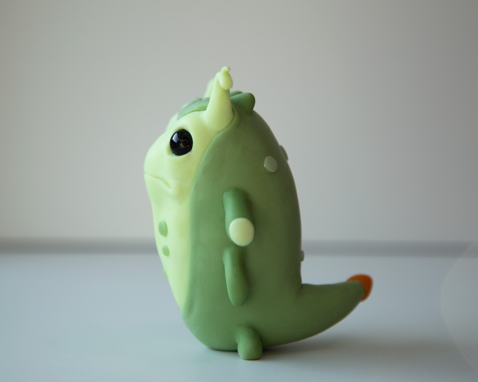 Cool and weird Germ Microbe figurine in anime style, polymer clay creature doll