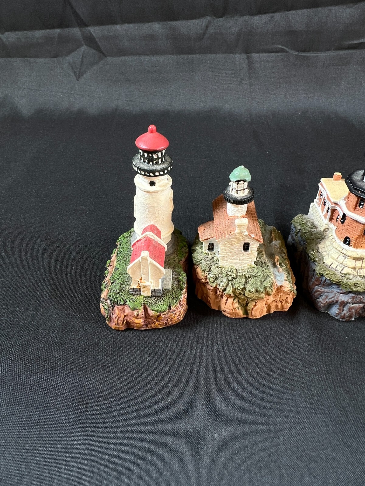 4 collectible vintage lighthouse/house statues 2.25” X 3.0” small decor
