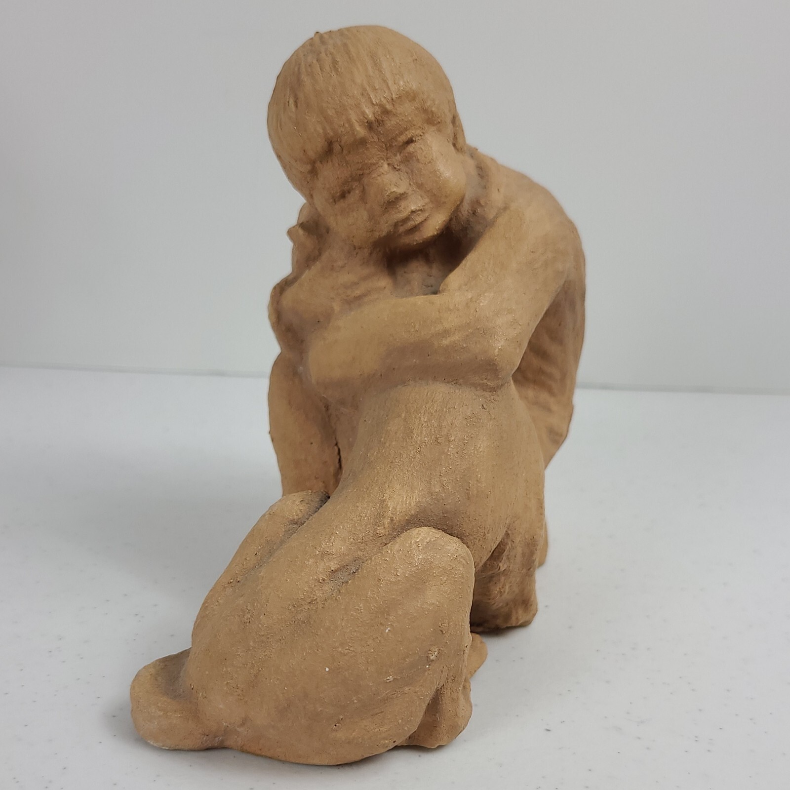 Boy and His Dog Figurine Approx. 5 3/4”H x 7″L Resin ? Painted Matte Sand Finish