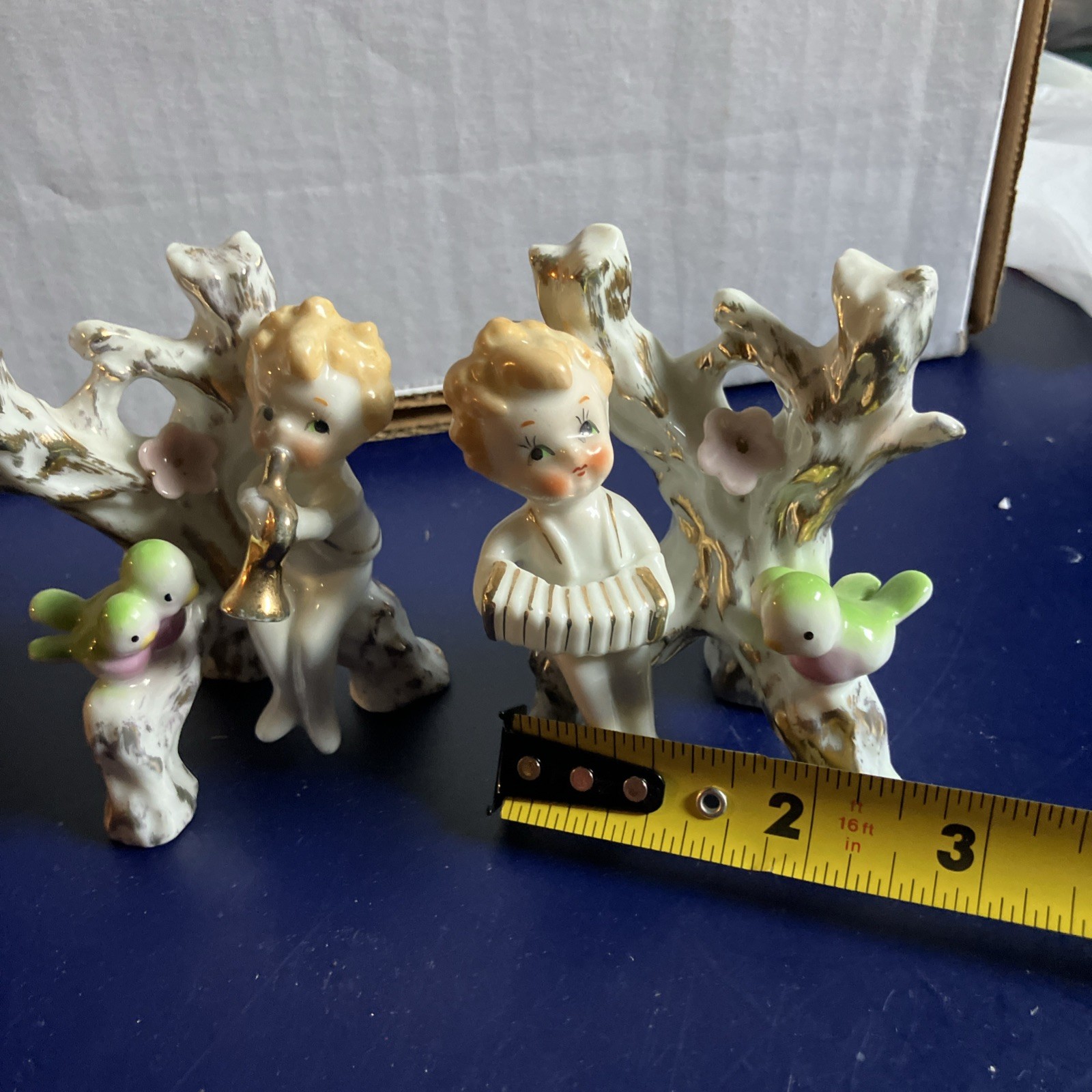 Two Vintage Cherubs Playing Instruments