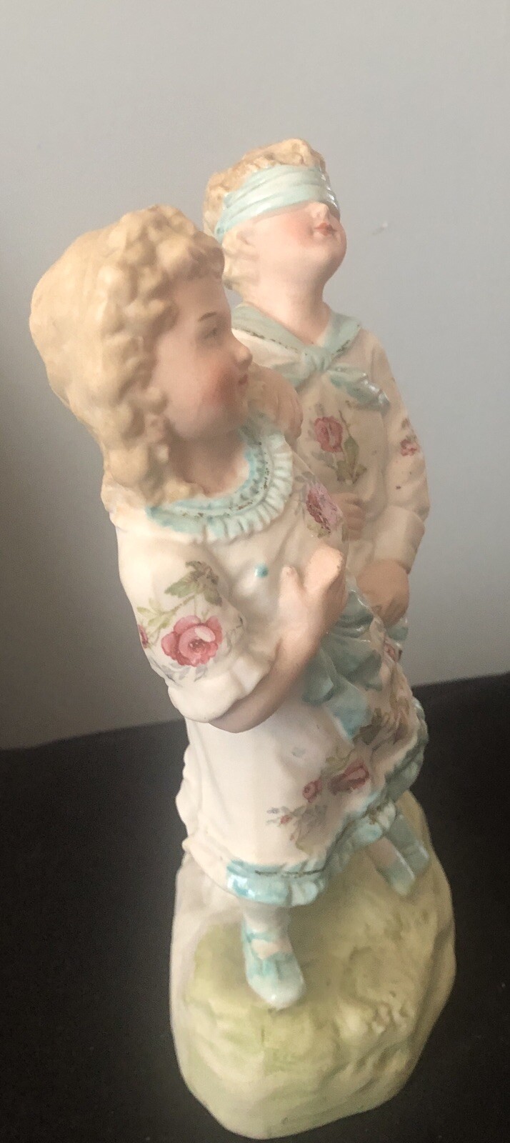 German Heubach Bisque Blind Man’s Bluff Figurine Painted Red Roses 7 3/4