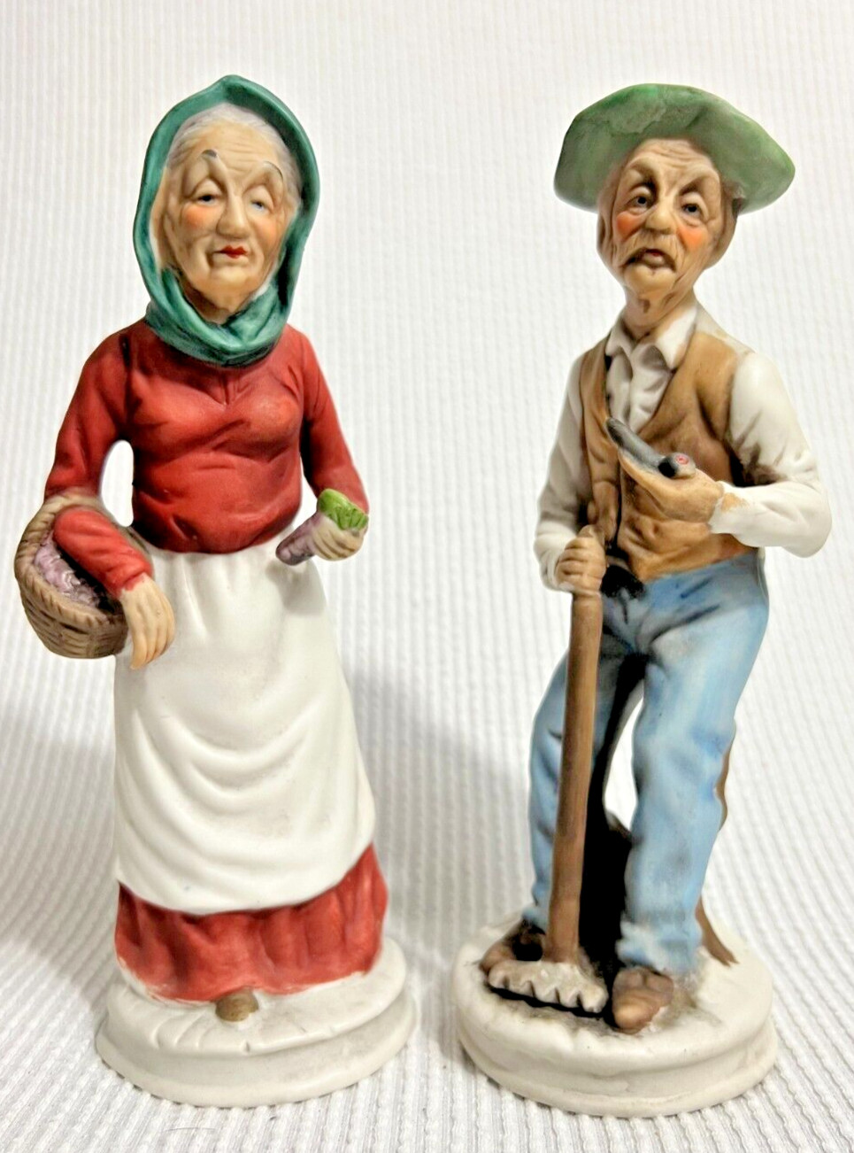 Vintage Hand Painted Farmers Old Lady & Man Basket Bisque Figurines 8″ Tall.
