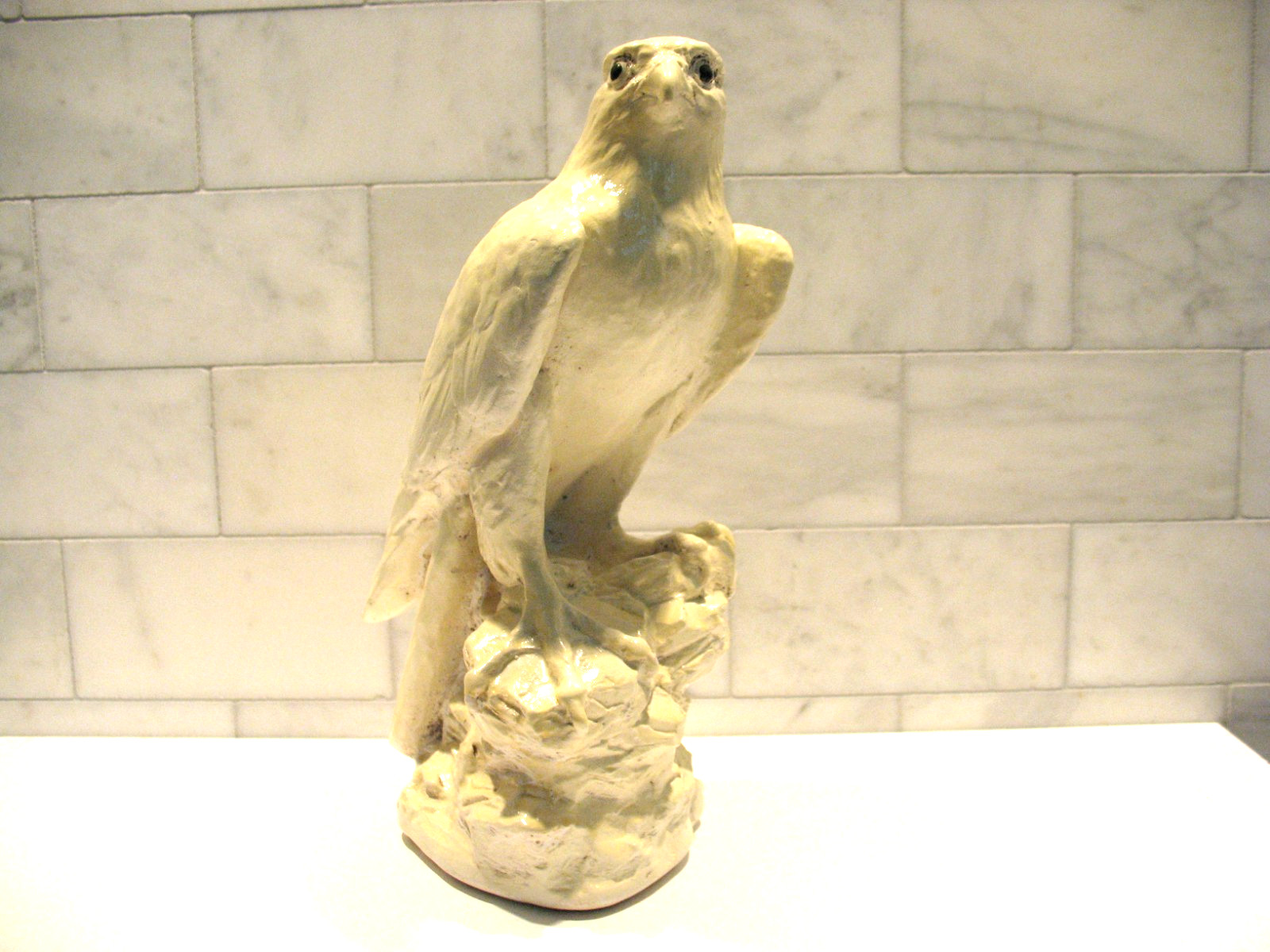 Peregrine Falcon Statue, 1982 by E. Sim, 11 inches tall.