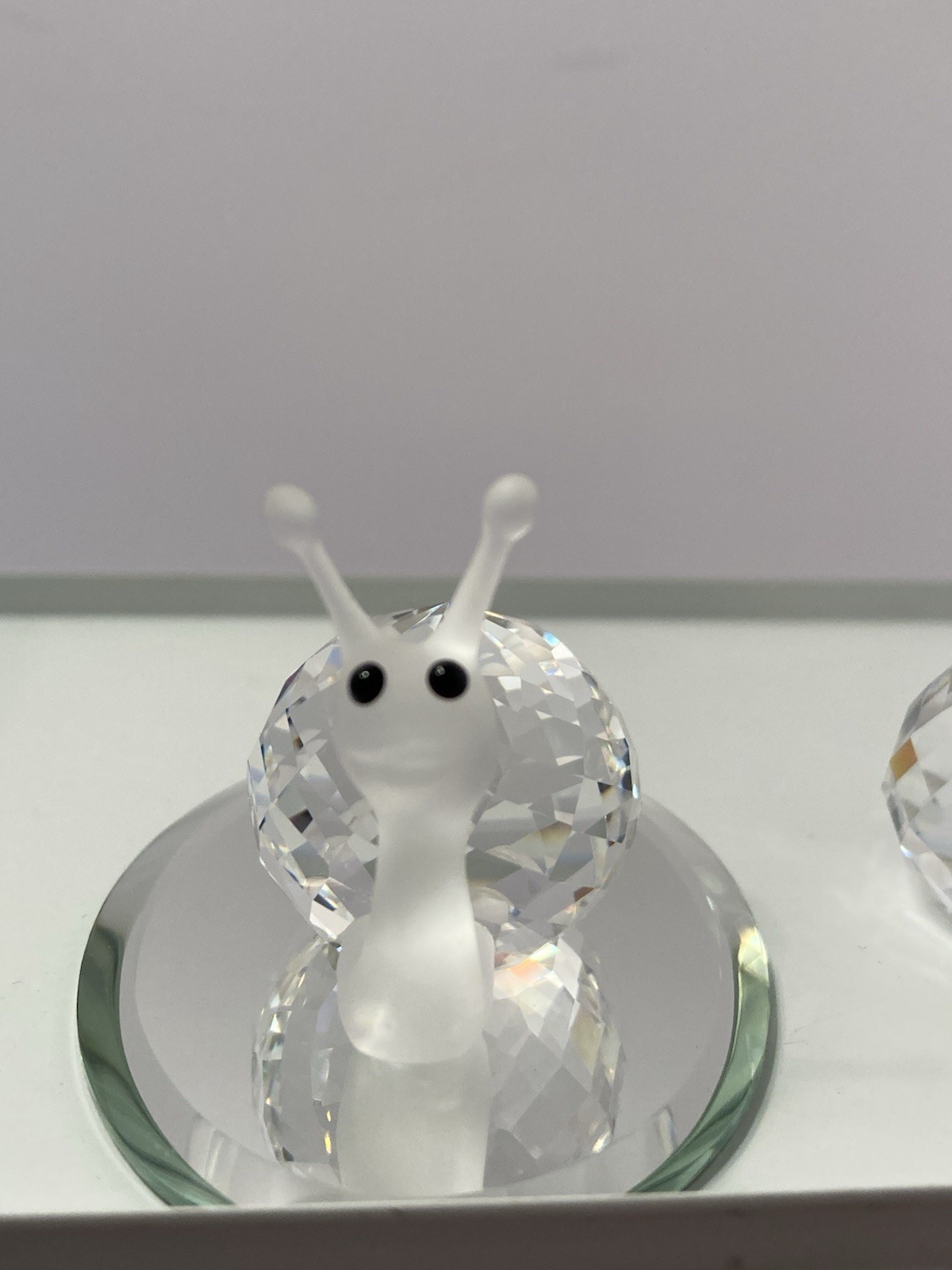 swarovski crystal small snail figurines (2)