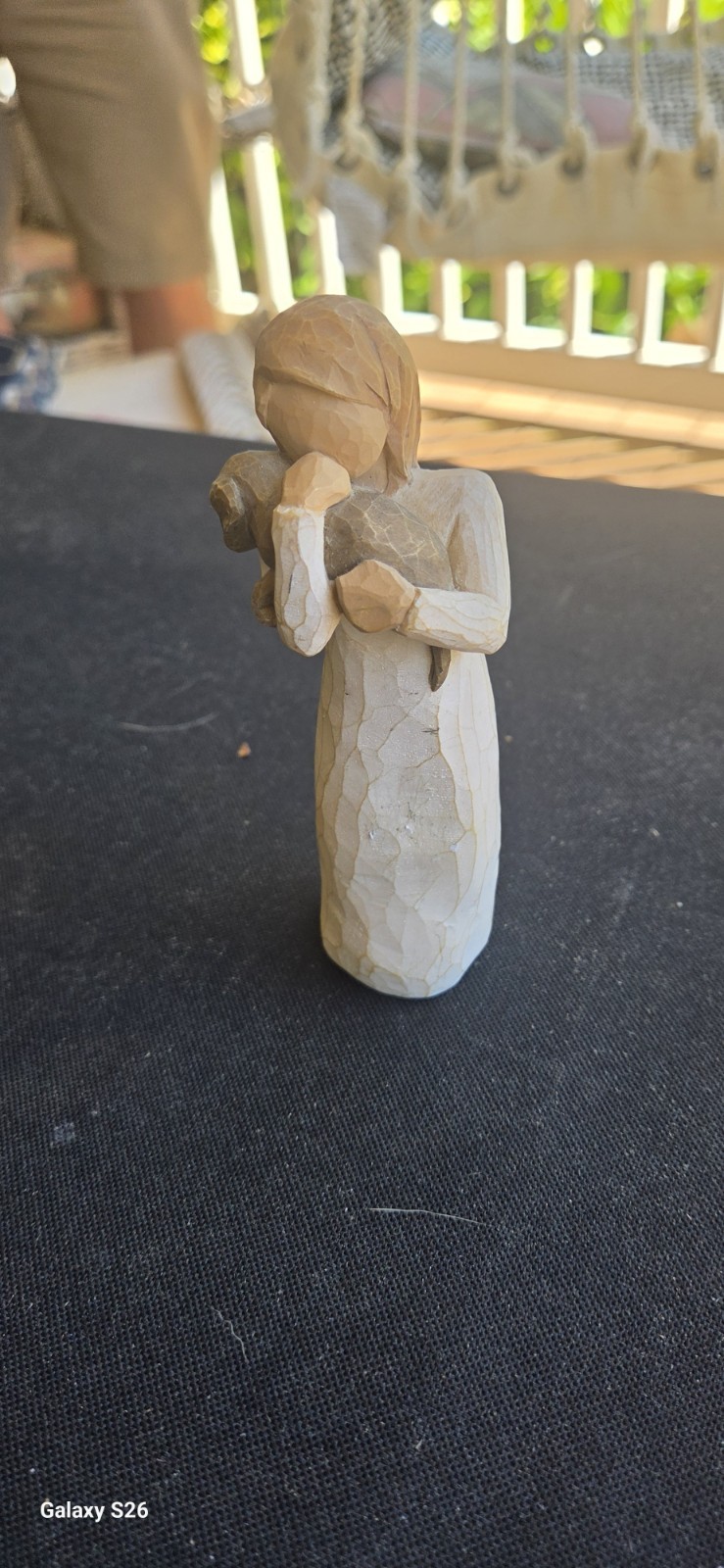 willow tree angel of friendship holding puppy