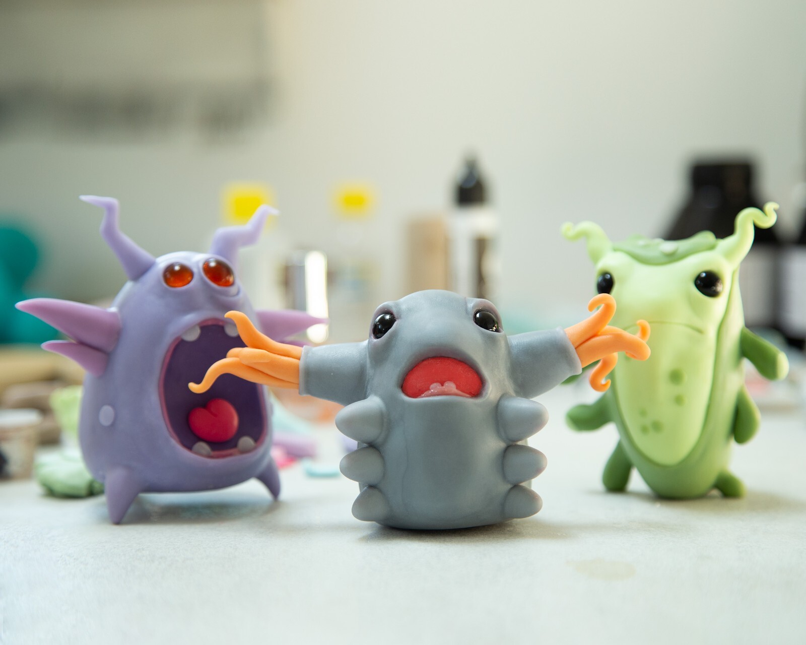 Cool and weird Germ Microbe figurine in anime style, polymer clay creature doll