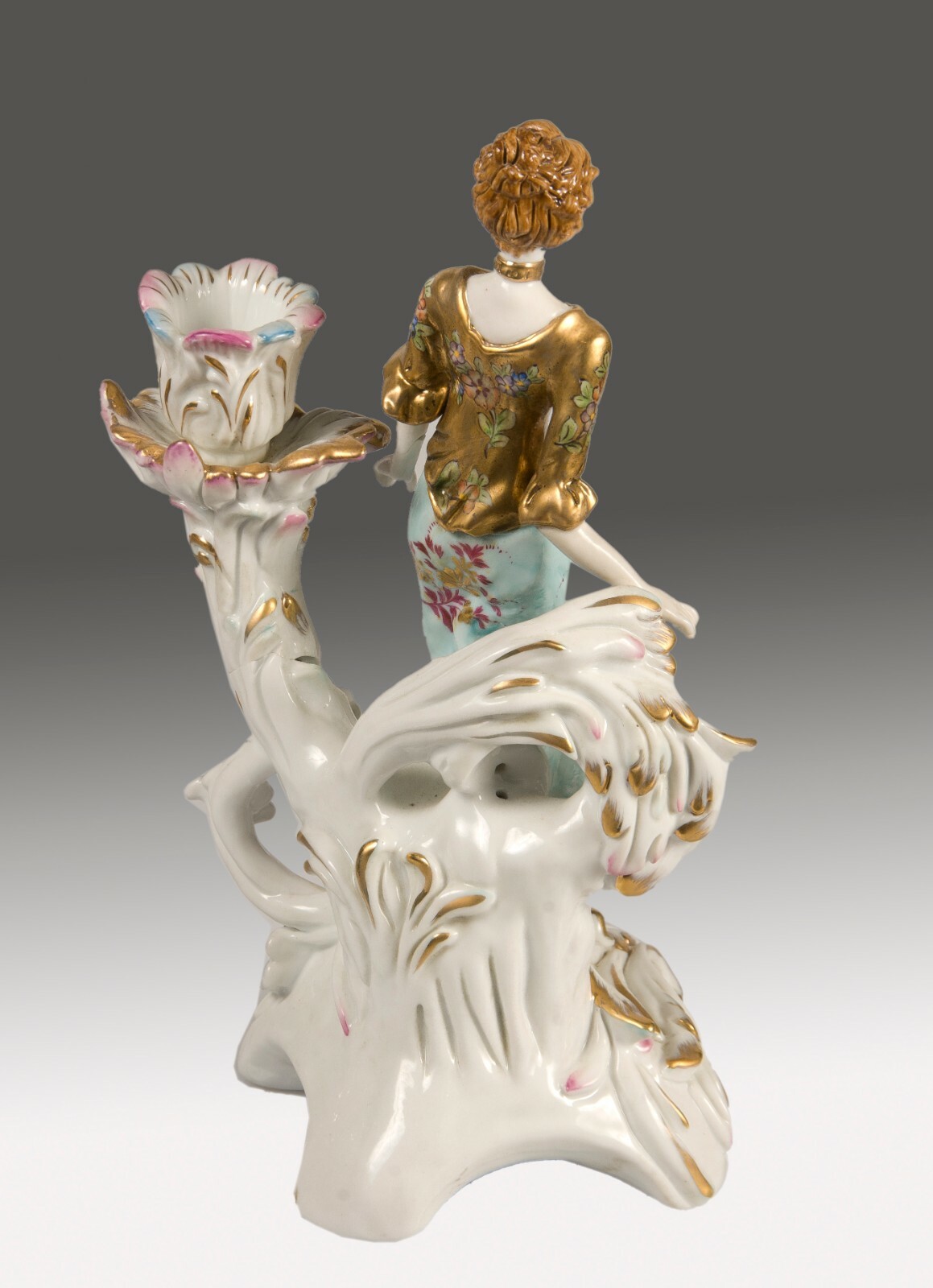 Pair of porcelain candle holders or candlesticks, after models from Sèvres.