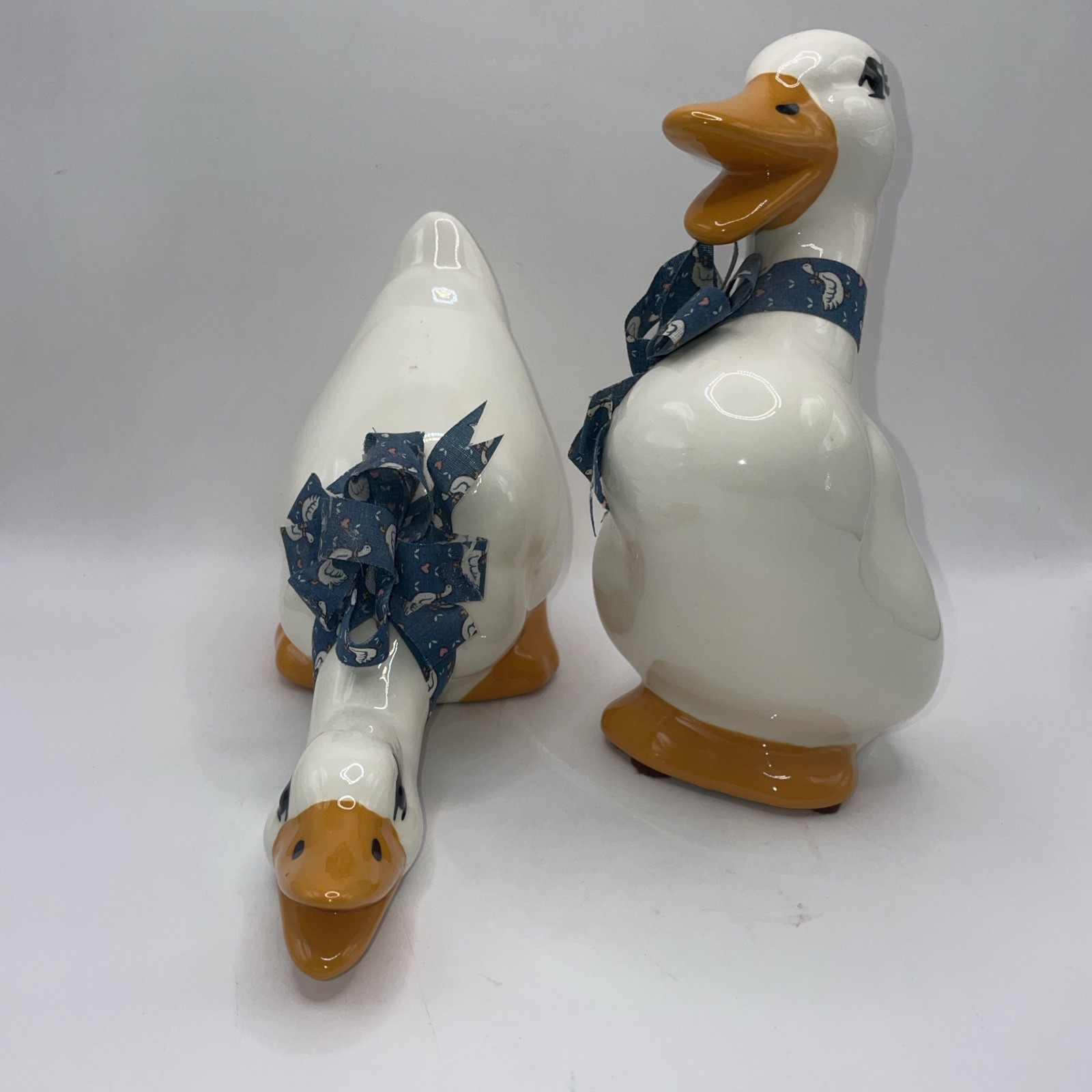 2 Vintage Country Geese Figuerines Blue Bows Very Cute