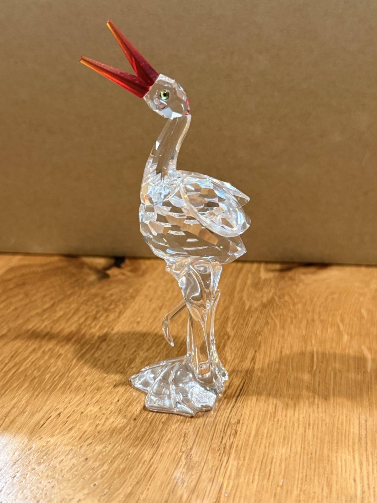 Swarovski crystal wading bird/crane-type figure with a red faceted crest