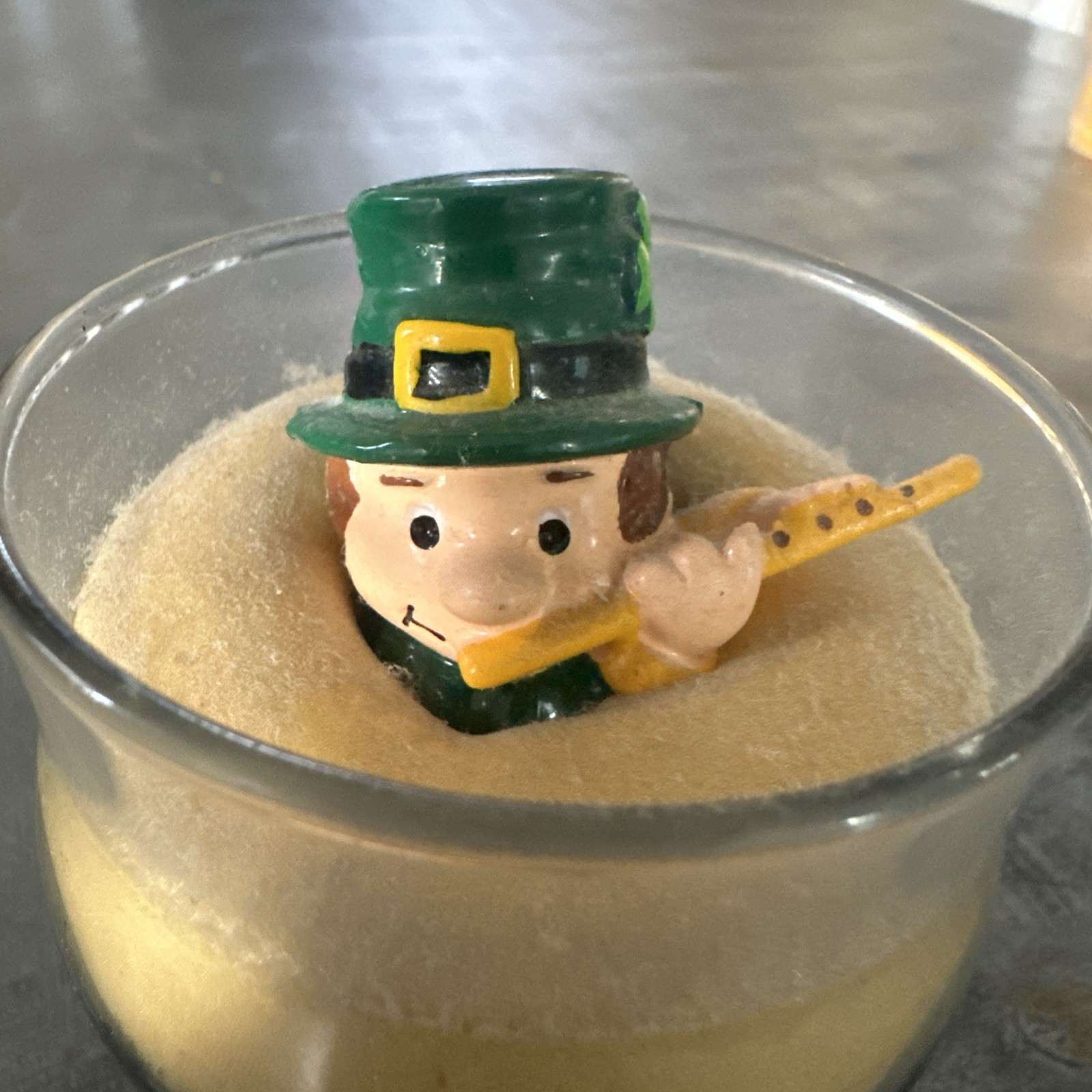 Green Hat Leprechaun Playing Flute Inside Miniature Glass “Into The Black”