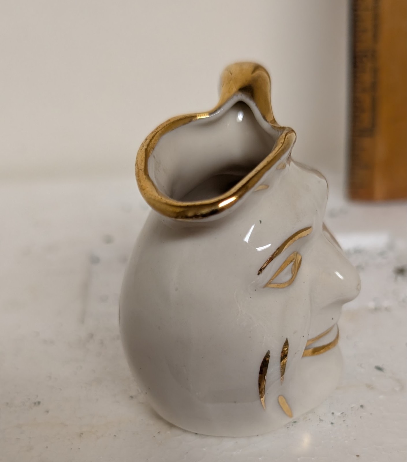 Vintage 2.5in gold trim 1946 porcelain happy smile face mini teapot cup